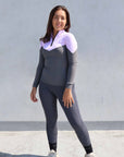 Grey riding leggings with lilac and grey base layer.