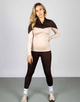 A model wearing our two toned base layer and brown riding leggings.