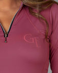 Zip detail on our berry pink equestrian base layer.