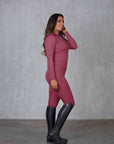 Model wearing berry pink base layer.