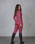 Model wearing berry pink base layer.