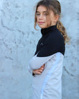 Our child model wearing our black and grey two toned base layer.