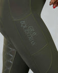 A view of the side of our leggings with it's phone pocket and subtle Gray Equestrian branding.