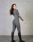 A view of the back of our grey riding leggings with full non slip seat.