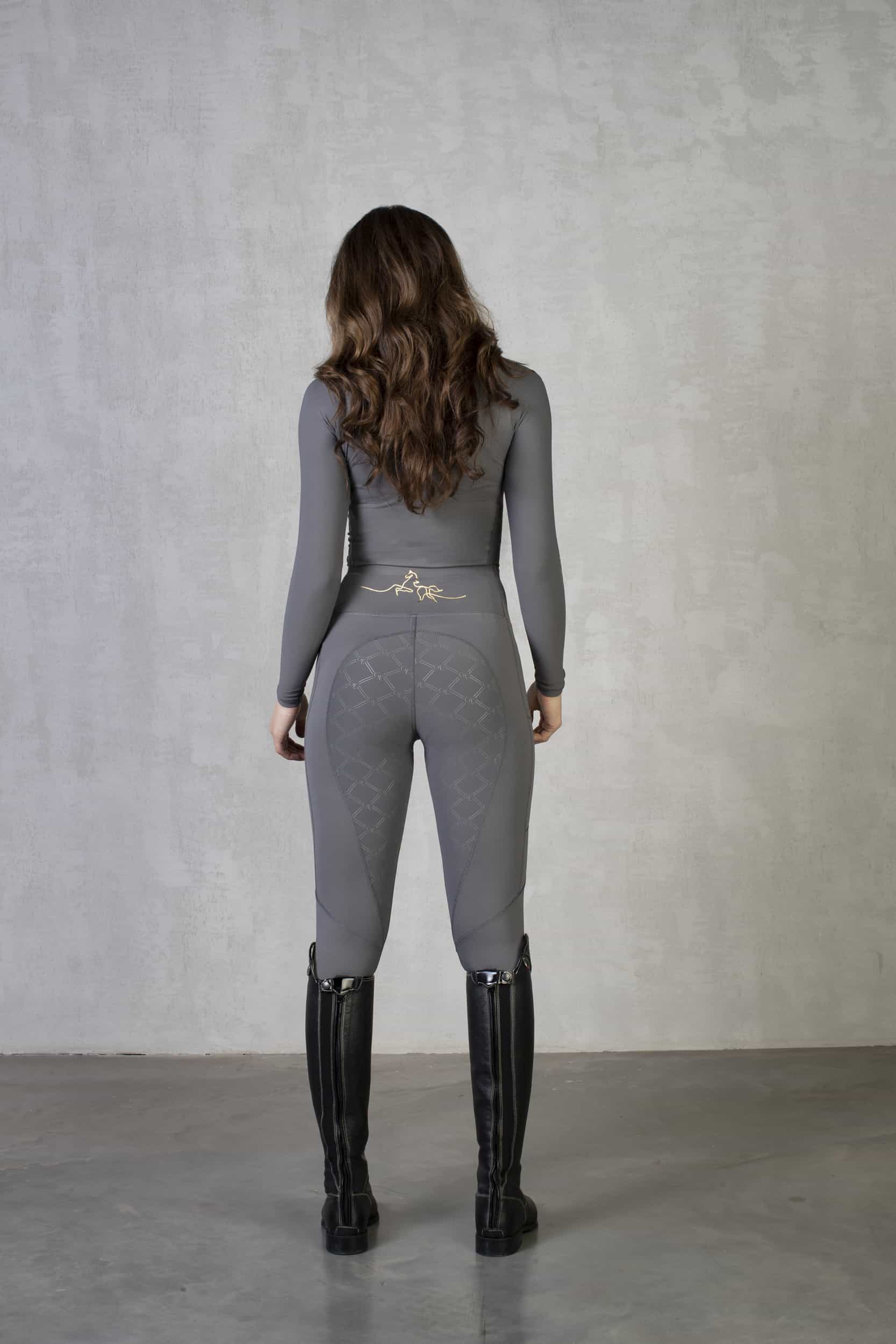 A view of the back of our grey riding leggings with full non slip seat.