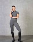 A model wearing our short sleeved grey base layer and matching equestrian leggings.