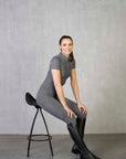 A model wearing our short sleeved grey base layer and matching equestrian leggings.