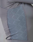 A close up of the dark grey side panel with GE branding.