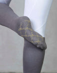 Our grey knee-high equestrian performance socks.