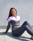 Grey riding leggings with lilac and grey base layer.