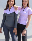 Two brunette models wearing lilac base layers
