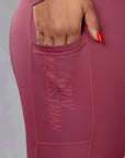 A close up of the sphone pocket in our fleece lined berry leggings.
