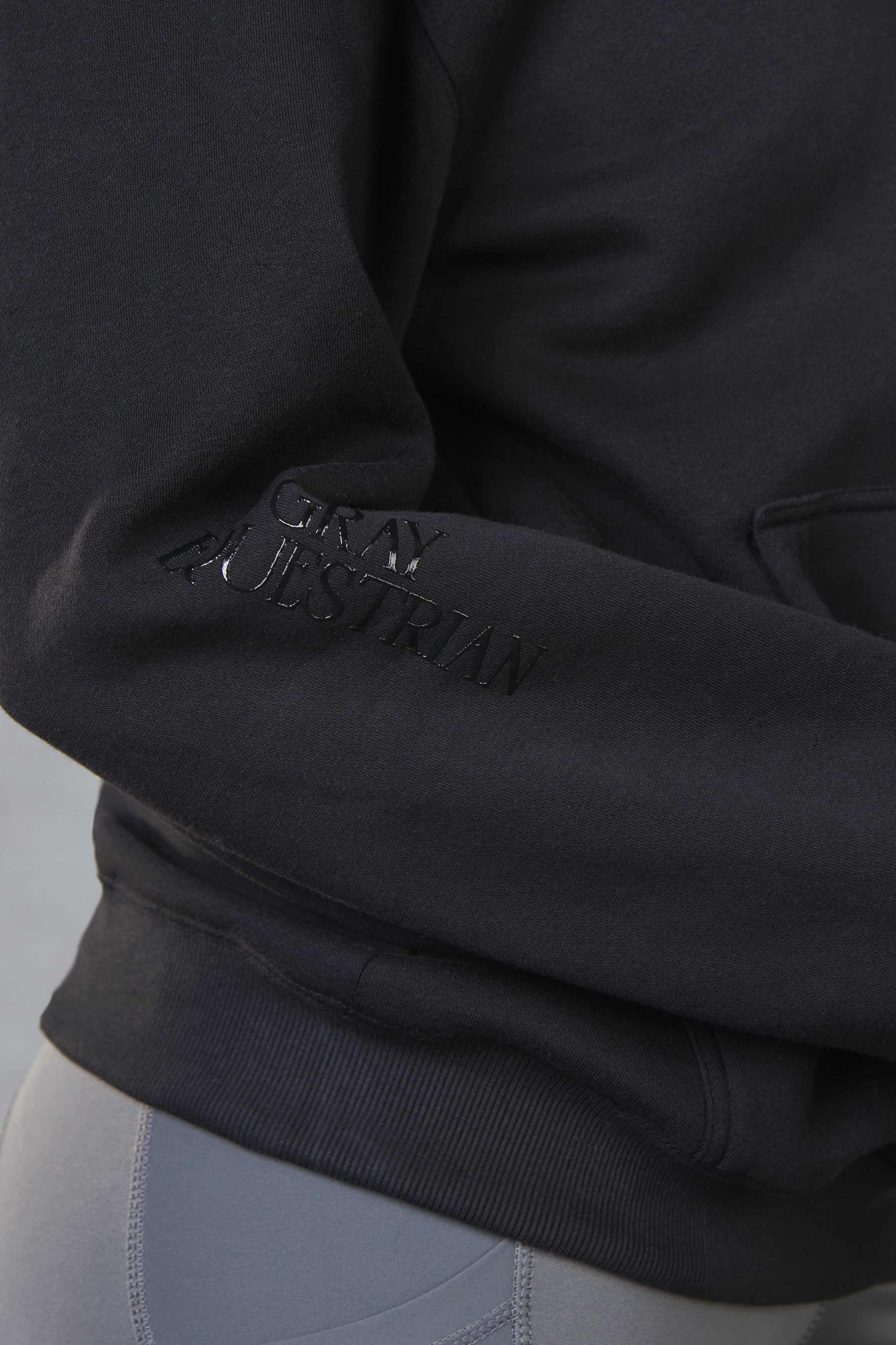 Close up of the black Grey Equestrian detailing on the sleeves.