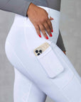 A close up of the phone pocket in our children's fleece lined competition leggings.