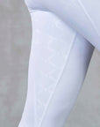 A close up of the white full non slip seat on our childrens competition leggings.