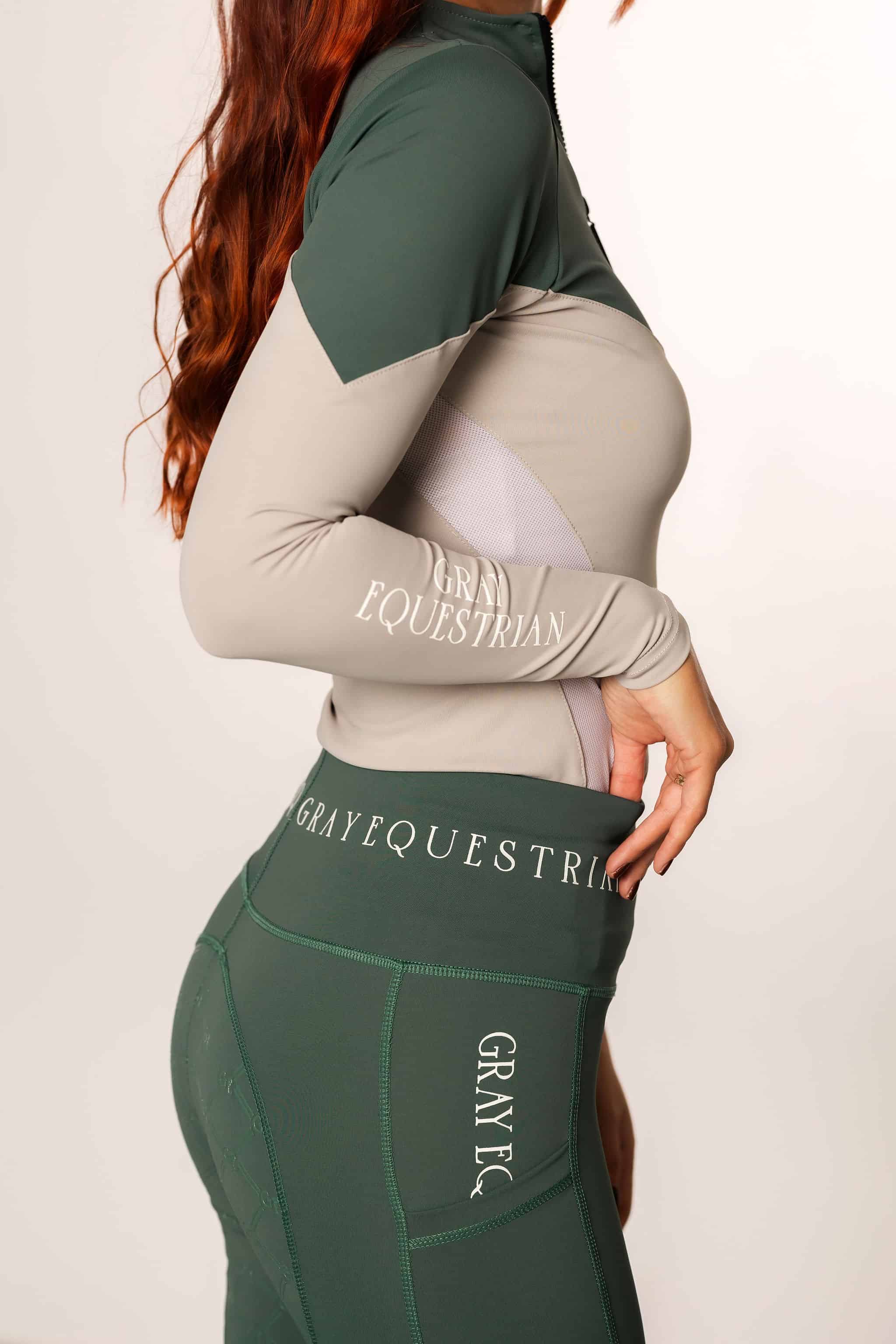 A video of the side of our long sleeved green and grey two toned base layer.