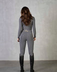 A view of the back of our grey riding leggings with full non slip seat.