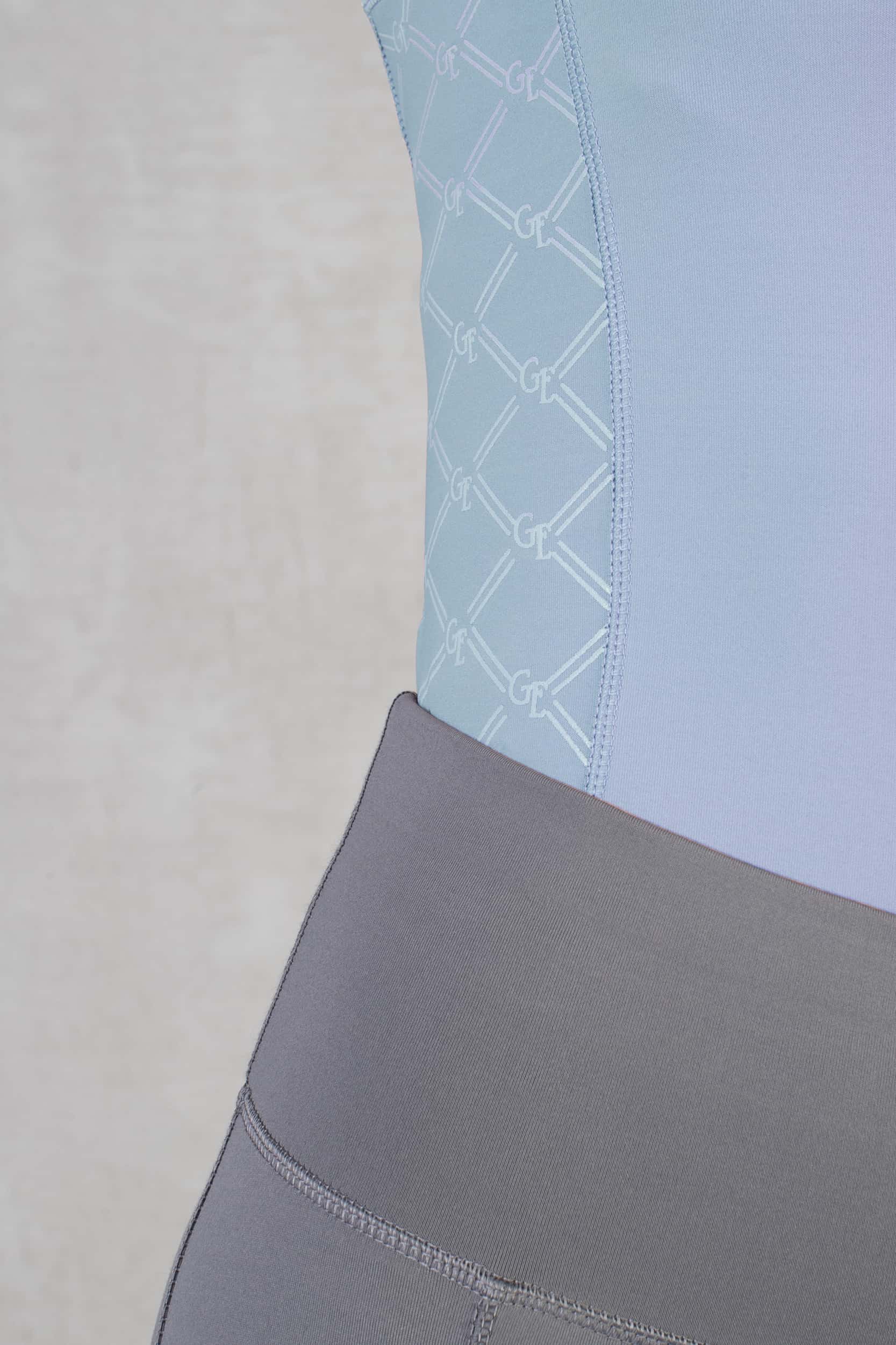 A close up of the mesh detail on the side of our light blue base layer.