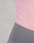 A close up of the mesh panel on our light pink short sleeved base layer.