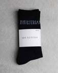 Our black riding socks with white Grey Equestrian branding.