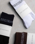 Three packs of our renew socks in the colours black, white and brown.