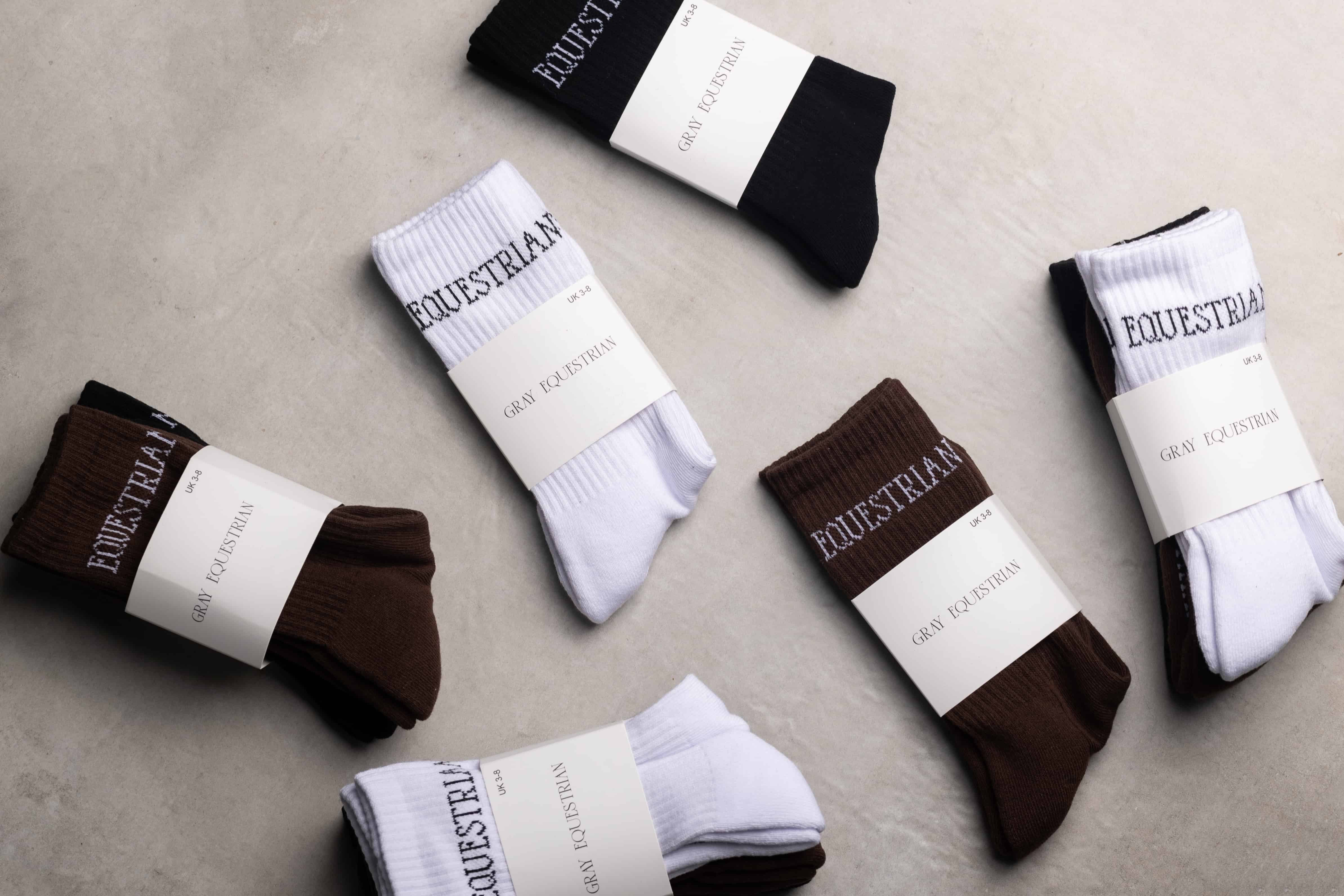 A selection of our white, black and brown renew socks.