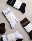 A selection of our white, black and brown renew socks.