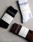 A pack of our white, brown and black renew 3 pack of socks.